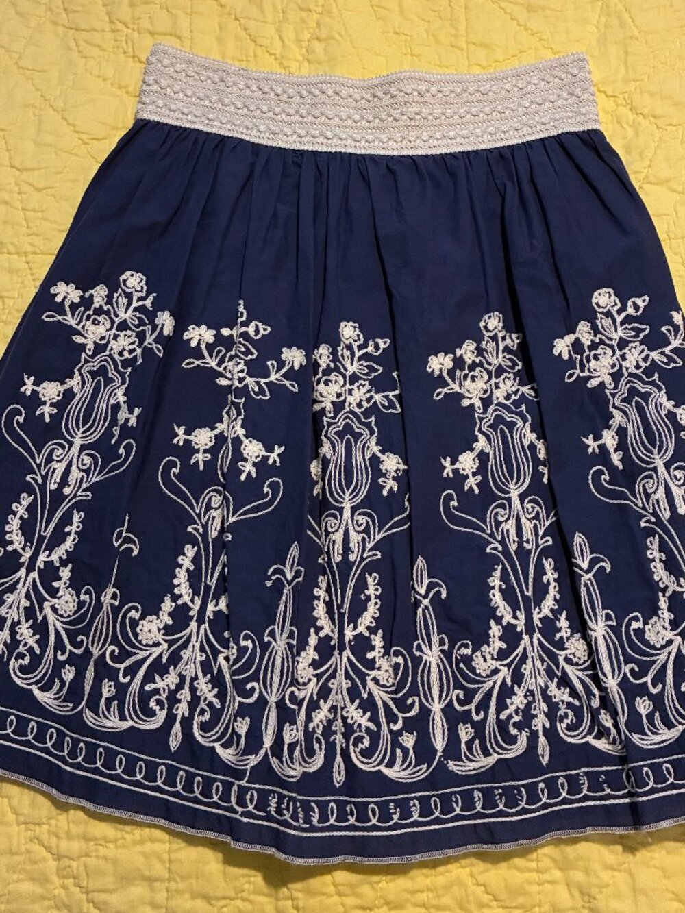 Metrowear skirt with white floral embroidery, sz M, blue